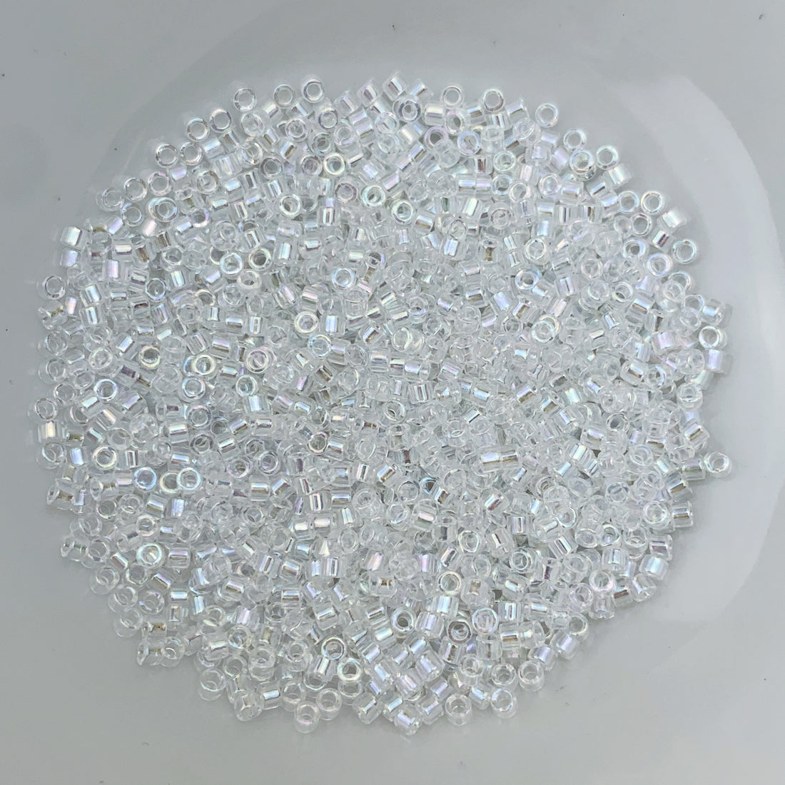 11/0 Delica - Crystal AB DB0051 - The Bead N Crystal & Enclave Gems