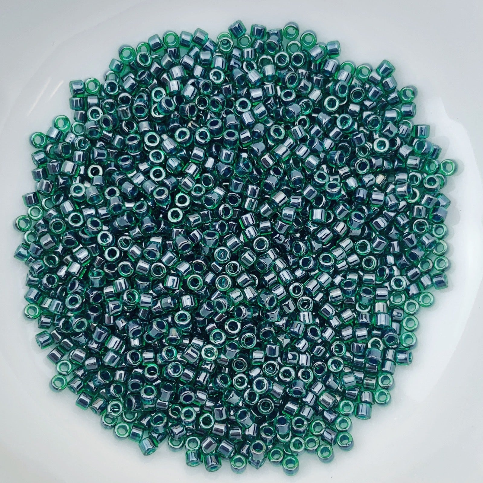 11/0 Delica - Lined Emerald Luster DB0275 - The Bead N Crystal & Enclave Gems