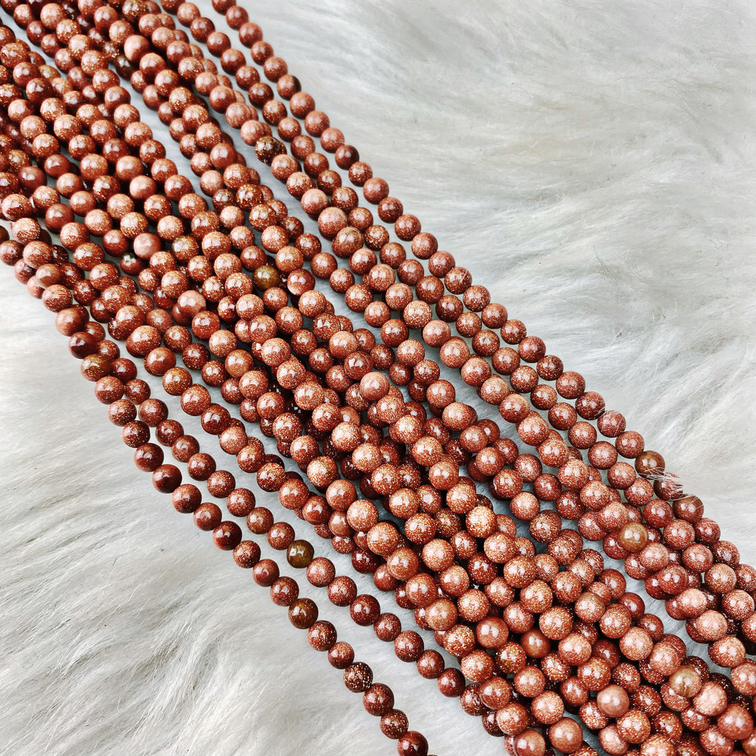 Goldstone 4 mm - The Bead N Crystal & Enclave Gems